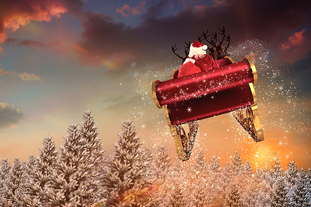 Composite image of santa flying his sleigh