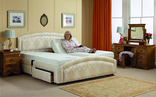 A women reclines on an Oak Tree Mobility rise and recline chair