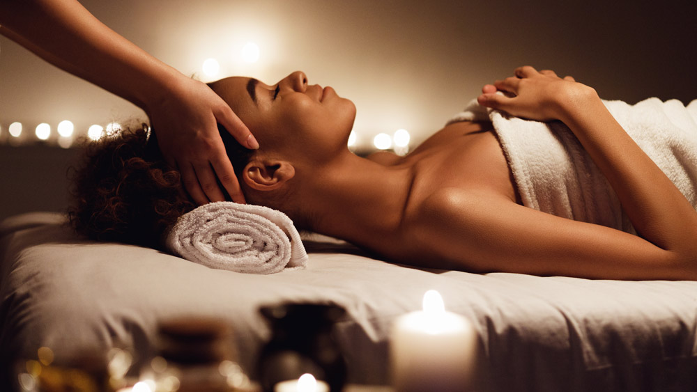 Woman relaxing having a head massage