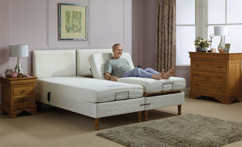 Man enjoying an adjustable bed