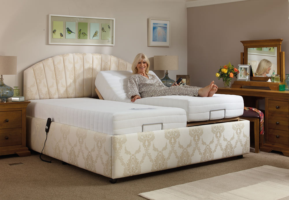 Woman enjoying her Oak Tree Mobility double adjustable bed