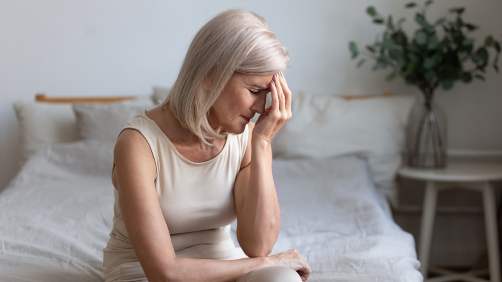 Elderly woman suffering from stress