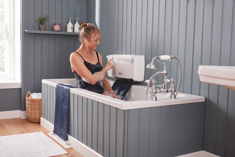 A lady enjoying a bath with her bath lift