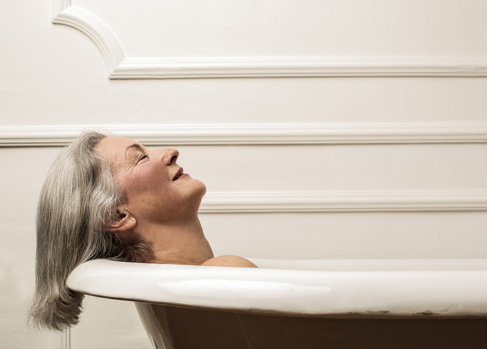 elderly woman enjoying a bath